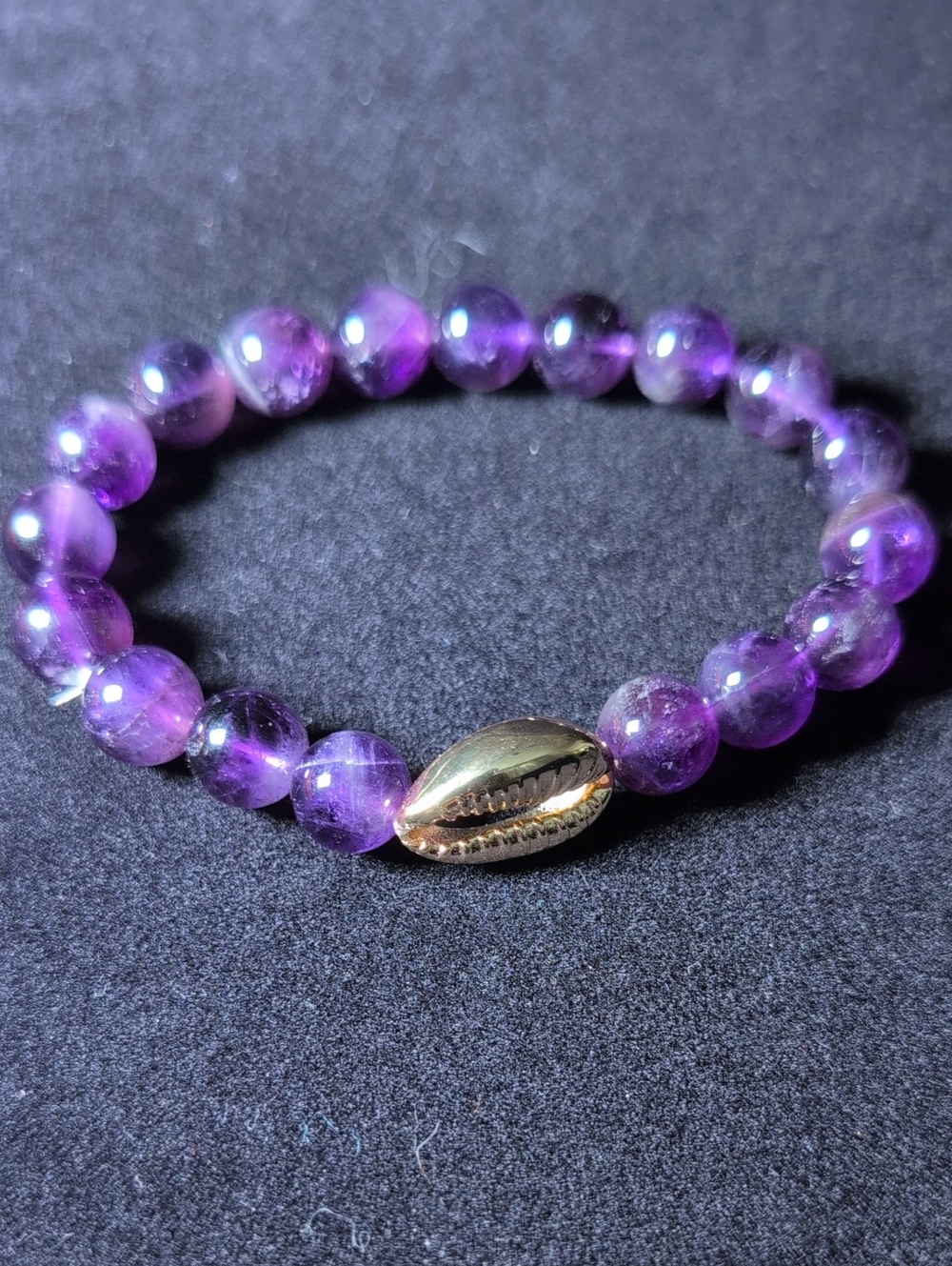 Amethyst Beaded Stretch Bracelet with Gold Cowry Shell Accent